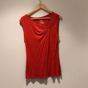 Red sleeveless blouse